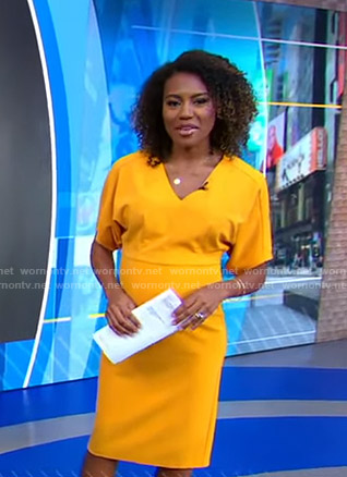 Janai's orange v-neck dress on Good Morning America