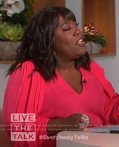 Sheryl's pink draped sleeve blouse on The Talk