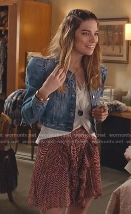 Alexis' puff sleeve denim jaket and red ruffle skirt on Schitts Creek