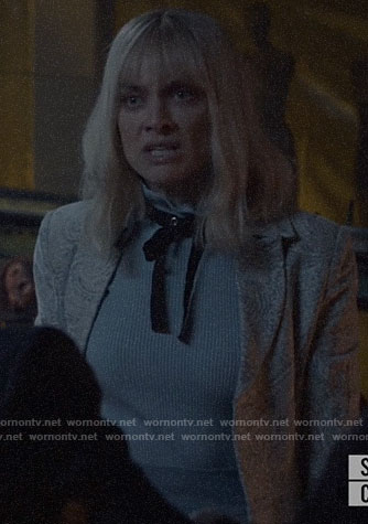 Beth's blue sweater with studded neck tie on Batwoman