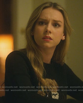 Carla's black martini teddy sweater on Elite