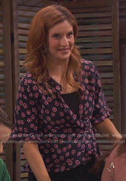 Chelsea's blue floral wrap blouse on Ravens Home