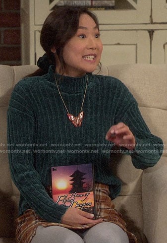 Jen's green chenille sweater and plaid skirt on Last Man Standing