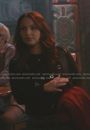 Jo's black grommet cable knit sweater on Greys Anatomy