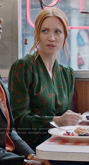 Julia's green key print blouse on Almost Family