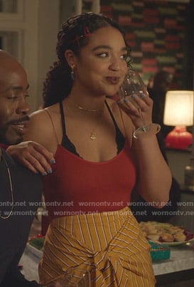 Kat's red camisole and orange striped skirt on The Bold Type