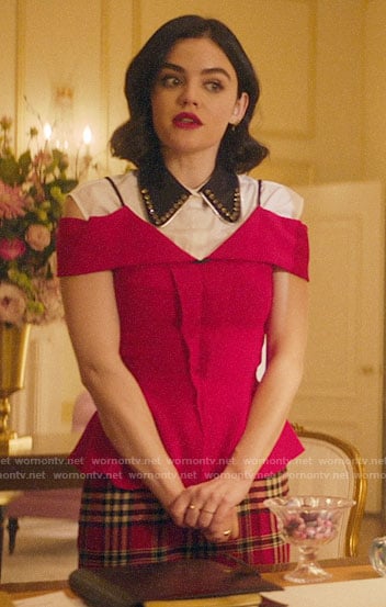 Katy's red cold-shoulder top over white embellished collar shirt and plaid pants on Katy Keene