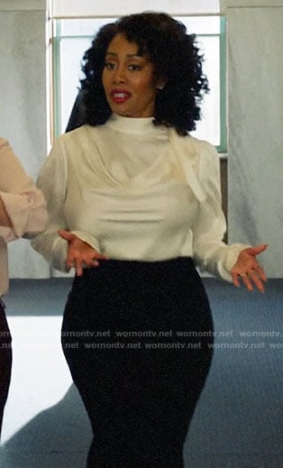 Lola's white draped blouse with bow on All Rise