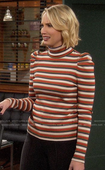 Mandy's striped puff-sleeve turtleneck on Last Man Standing