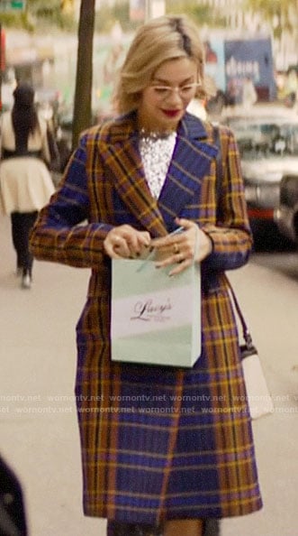Pepper's blue and yellow plaid coat on Katy Keene