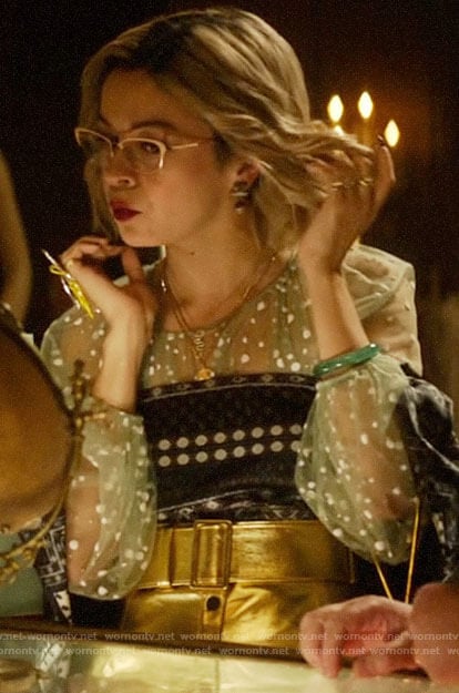 Pepper's sheer green dotted blouse and gold skirt on Katy Keene