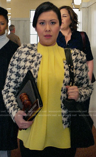 Sherri's yellow pleated top and houndstooth jacket on All Rise