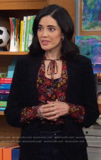 Sofia's floral blouse with tie on The Neighborhood