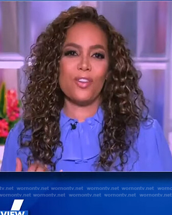 Sunny's blue ruffle neck blouse on The View