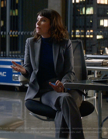 Taylor's grey suit on Bull