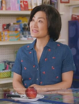Uma's floral denim blouse on Kims Convenience