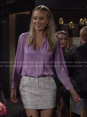 Abby's lilac v-neck blouse and tweed mini skirt on The Young and the Restless