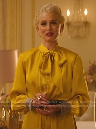 Gloria's yellow tie neck dress on Katy Keene