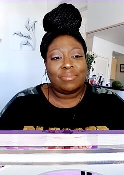 Loni's black sequin blessed sweatshirt on The Real