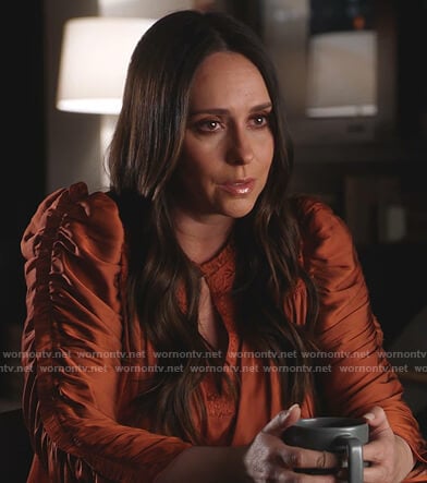 Maddie's orange ruched sleeve satin blouse on 9-1-1