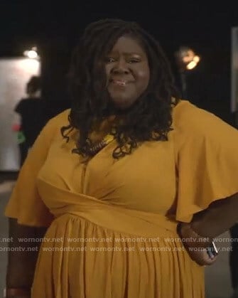 Becky's orange twist front dress on Empire