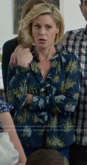 Claire's navy floral blouse with ruffles on Modern Family