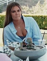 Khloe's white stripe oversized shirt on Keeping Up with the Kardashians