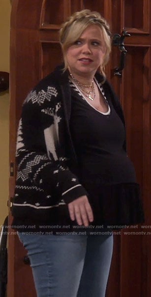 Kristin's black and white reindeer cardigan on Last Man Standing