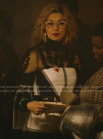 Pepper's white fringe sleeve dress on Katy Keene