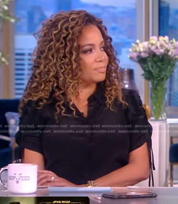 Sunny's black ruched sleeve blouse on The View