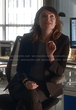 Taylor's pinstripe suit on Bull