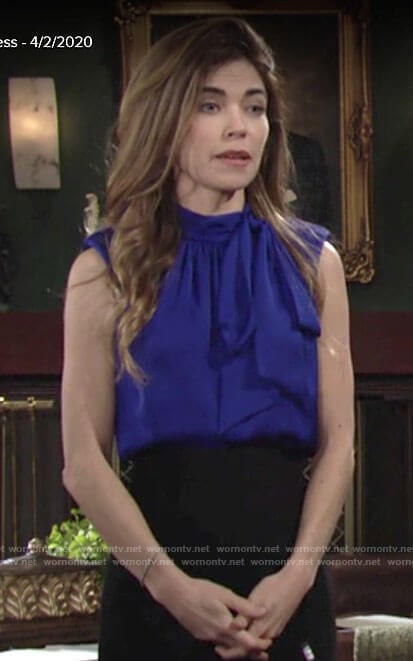 Victoria's sleeveless blue tie neck blouse on The Young and the Restless
