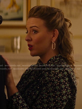 Amanda's black and green printed blouse on Katy Keene