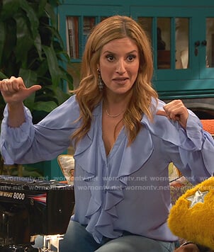 Chelsea's blue ruffled v-neck blouse on Ravens Home