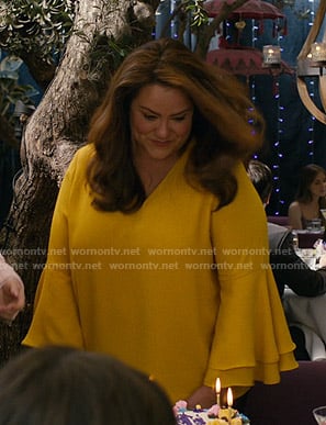 Katie's yellow bell sleeve blouse on American Housewife