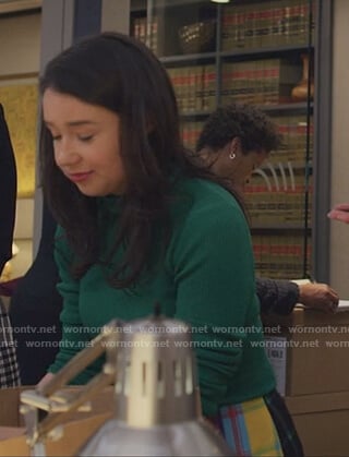 Marissa's multicolored plaid skirt and sweater on The Good Fight
