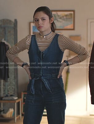 Nia's orange striped top and denim jumpsuit on Supergirl