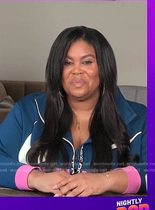Nina's navy and pink colorblock jacket on E! News Nightly Pop