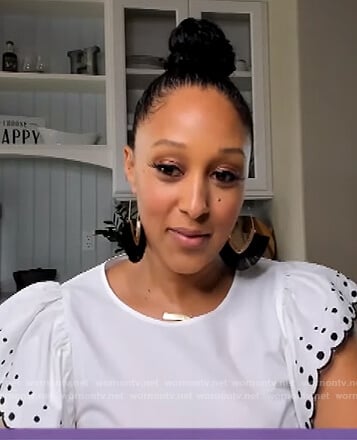 Tamera's white eyelet ruffle blouse on The Real