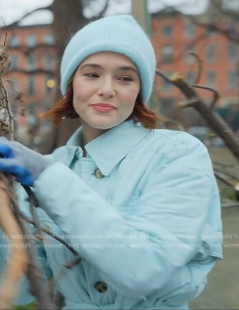 Infinity's blue quilted coat on The Politician