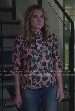 Sutton's pink and green print tie neck top on The Bold Type
