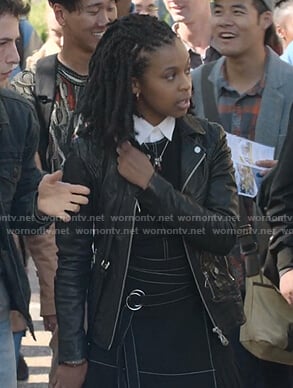 Ani's black belted dress with white stitching on 13 Reasons Why