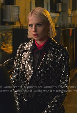 Astrid's black metallic monogram print moto jacket on The Politician