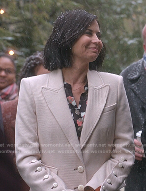 Cassie's ivory button-sleeve coat on Good Witch
