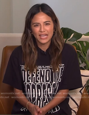 Erin's black oversized graphic tee on E! News Daily Pop