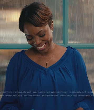 Helen's blue v-neck top on Sweet Magnolias