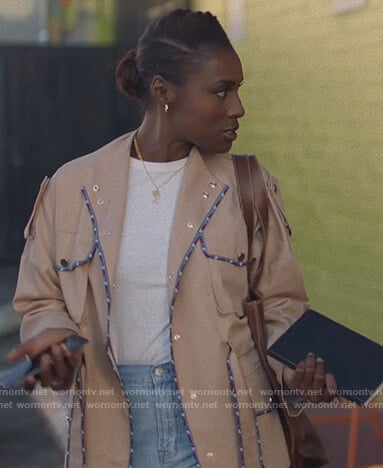 Issa's beige embroidered trim coat on Insecure