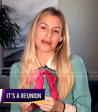 Morgan's green blouse with pink bow on E! News Nightly Pop