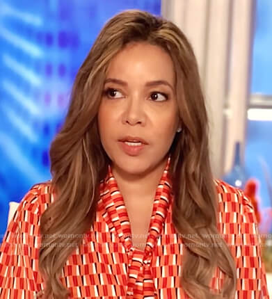 Sunny's red geometric tie neck blouse on The View