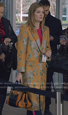 Sutton's orange floral coat on The Bold Type